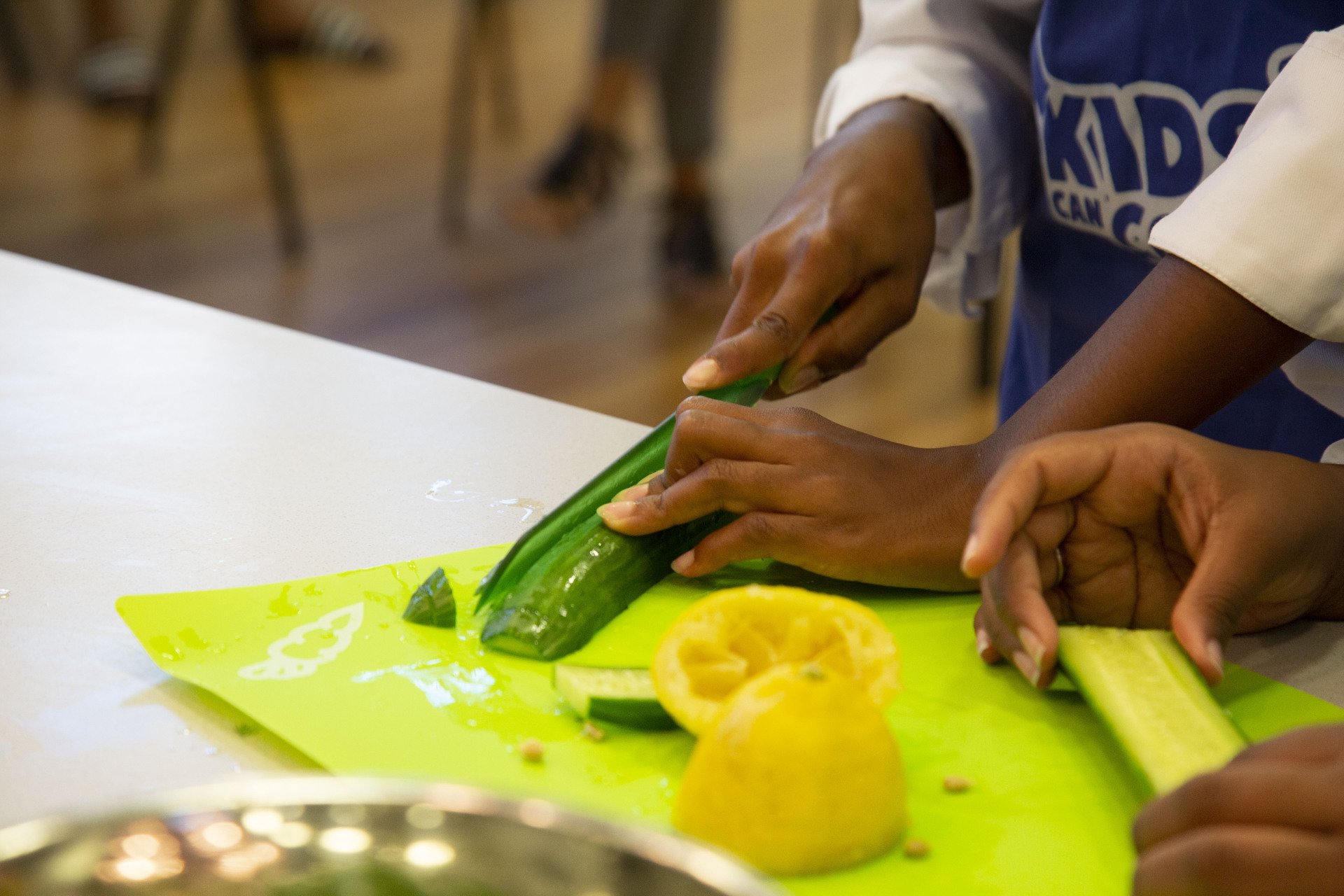 a kid cutting food